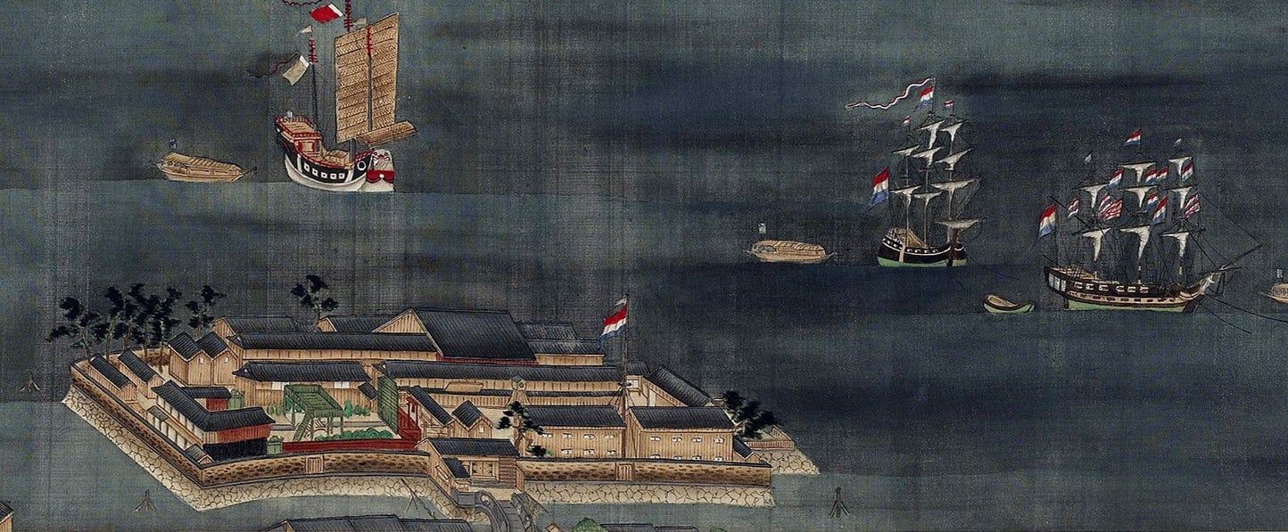 Dejima, the small fan-shaped Dutch trading island, with Dutch ships at anchor nearby. For over two centuries it was one of the few windows between Japan and Europe.